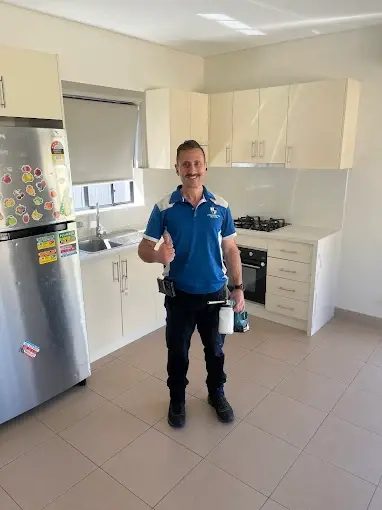 Sydney Pesties technician after professional lice and pest treatment in a Sydney home